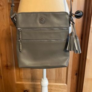 Anne Klein taupe leather cross body bag. Outside compartments on front & back.